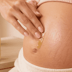 mark stretch huile sur ventre femme enceinte